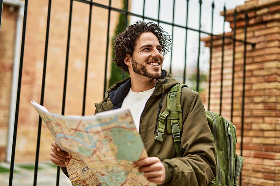 A man traveling after getting a personal loan to finance his vacation.