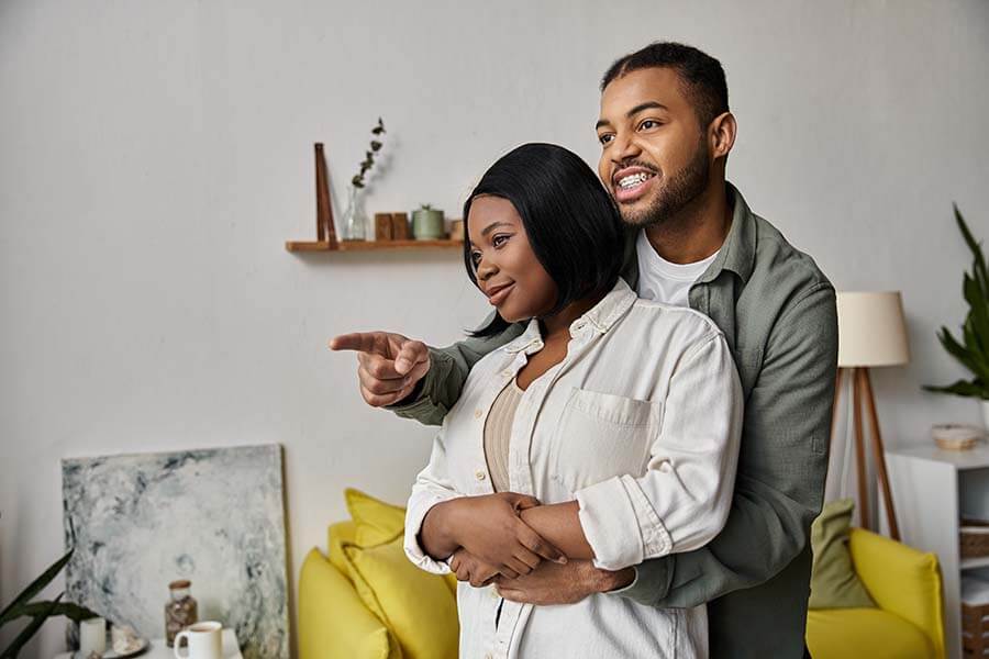 A couple discussing the home projects they'll do with their home equity loan.