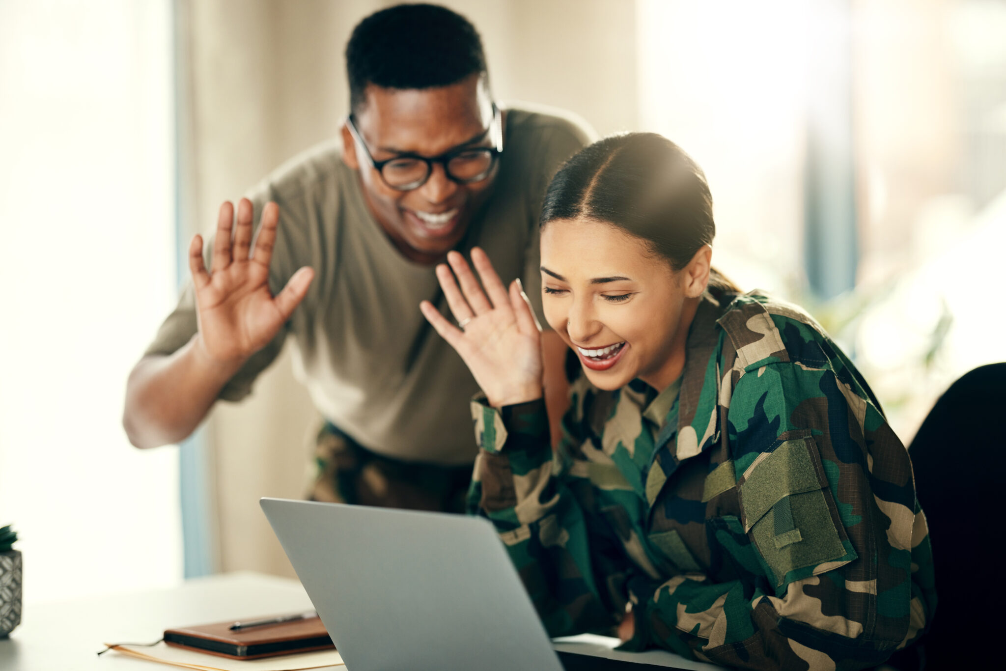 A couple meeting their mortgage officer online to discuss mortgage rates.